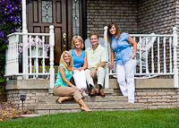Family Portrait Outside Home